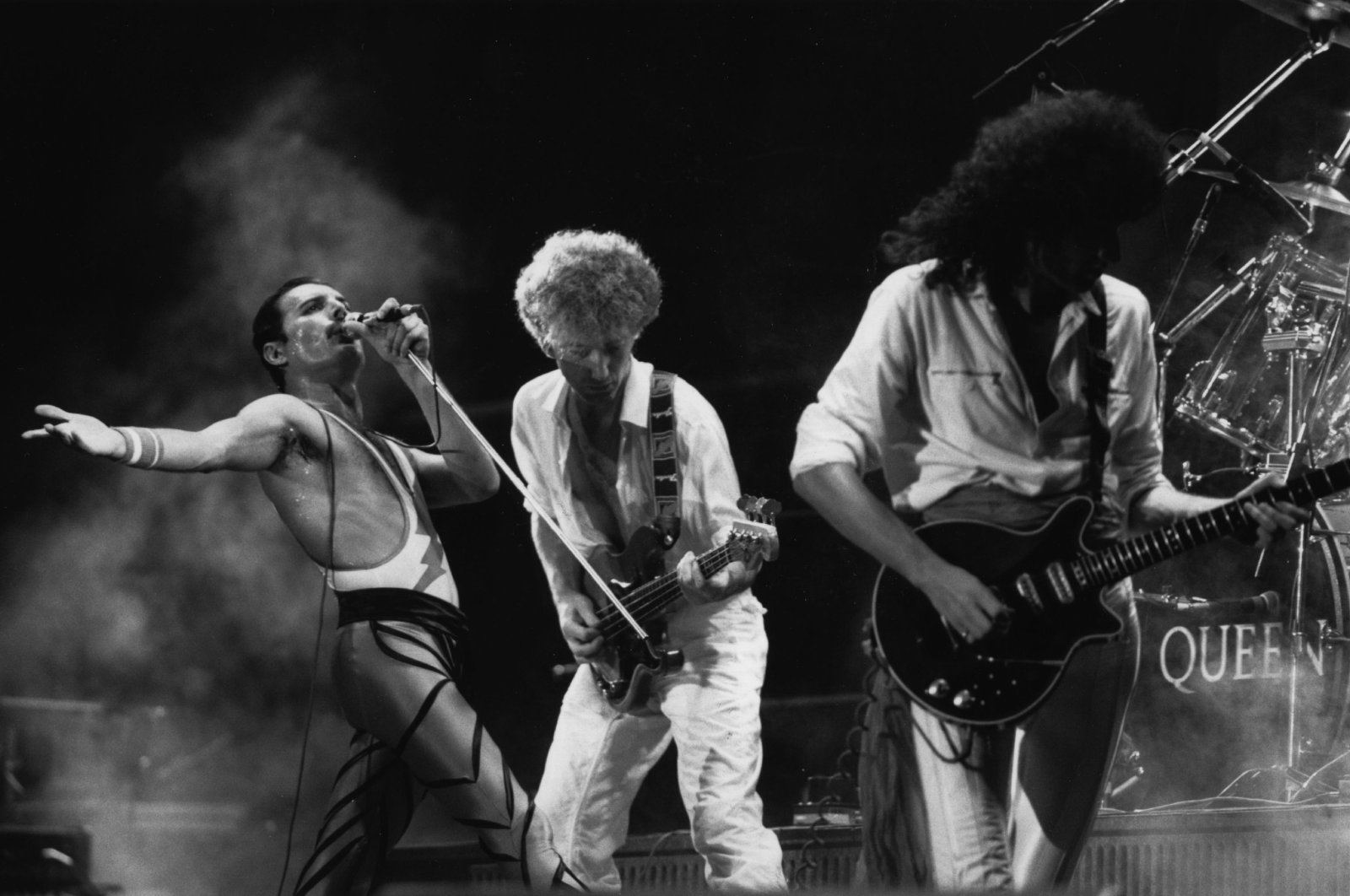 British rock group Queen in concert, from left to right, Freddie Mercury, John Deacon and Brian May. (Getty Images Photo)