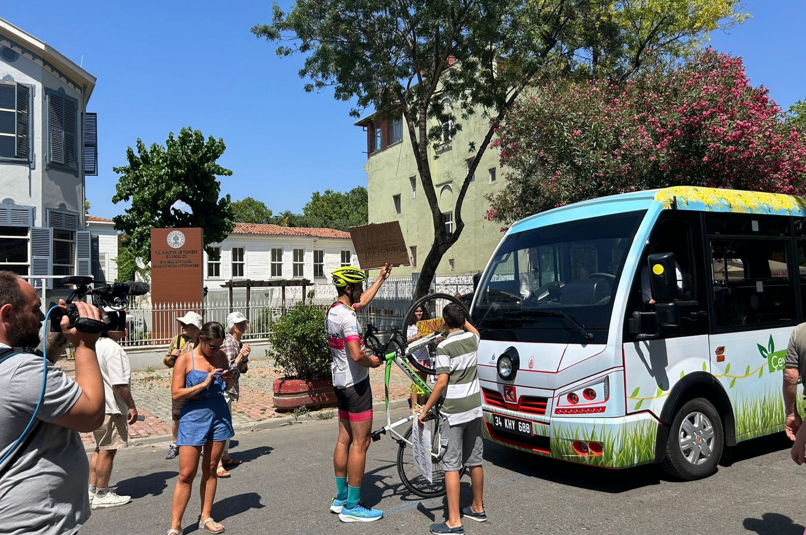 Locals protest in Büyükada over the introduction of minibuses, Büyükada, Istanbul, Türkiye, June 21, 2024. (AA Photo)