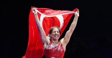 Türkiye's Yasemin Adar Yiğit during the women's wrestling 76 kg. weight class gold medal match against Austria's Martina Kuenzat the European Wrestling Championship, Zagreb, Croatia, April 20, 2023. (Getty Images Photo)