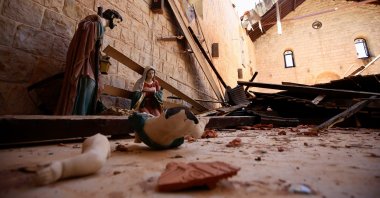 A broken statue lies at St. Georgios Church damaged in Israeli attacks in Yaroun, southern Lebanon, June 21, 2024. (EPA Photo)