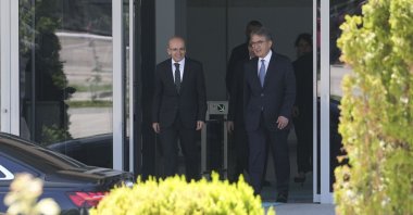 CHP Deputy Chair Yalçın Karatepe (R) leaves after a meeting with Treasury and Finance Minister Mehmet Şimşek (L) in Ankara, Türkiye, June 24, 2024. (AA Photo)