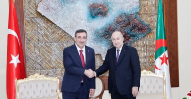 Vice President Cevdet Yılmaz and Algerian President Abdelmadjid Tebboune shake hands at Mouradia Palace in the capital Algiers, Monday June 24, 2024. (AA Photo)