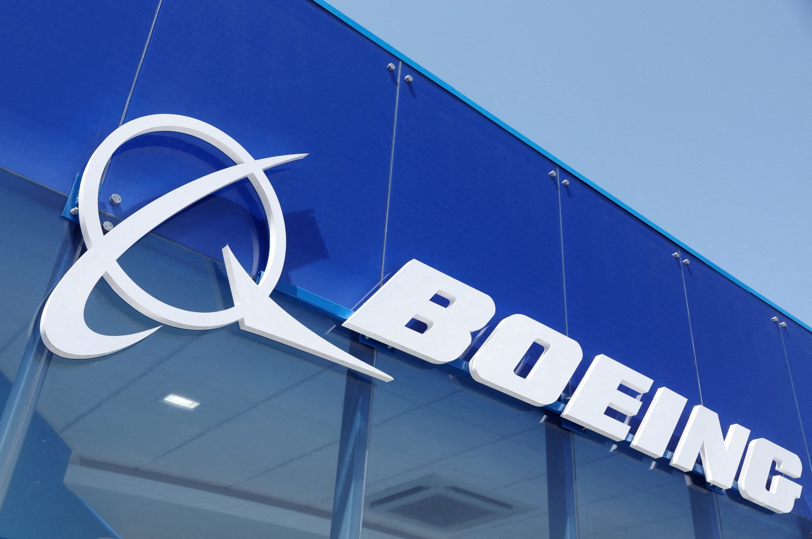 Signage for Boeing is seen on a trade pavilion at the Farnborough International Airshow, in Farnborough, Britain, July 19, 2022. (Reuters Photo)