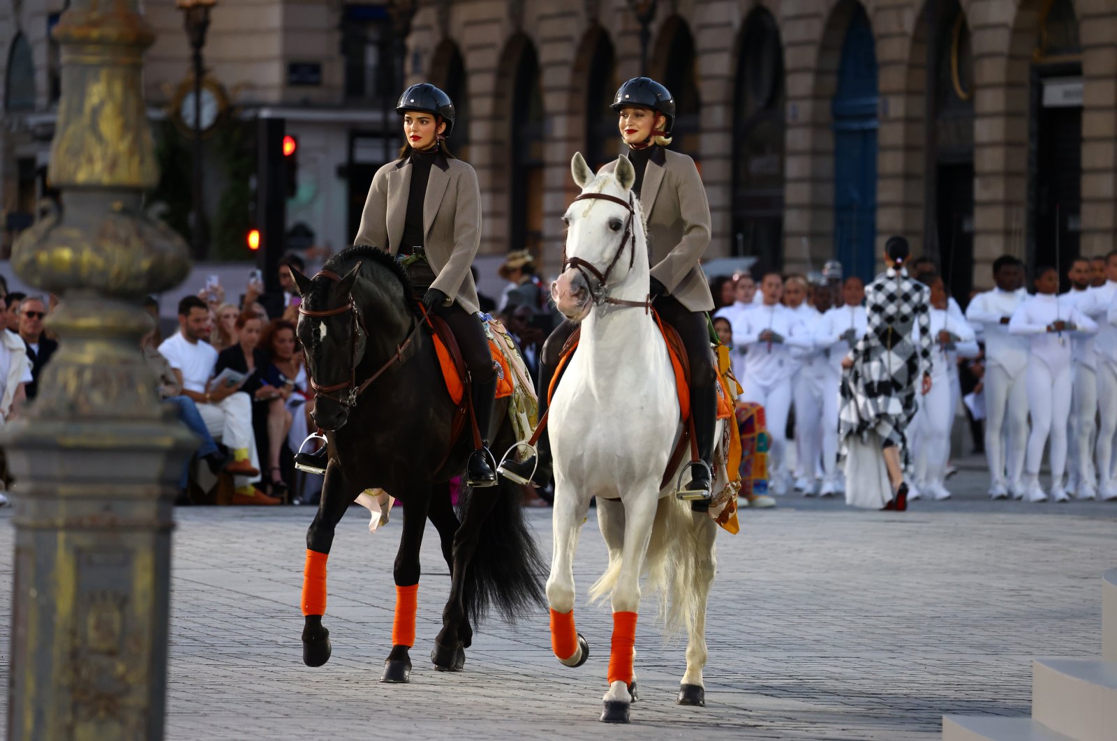 Kendall Jenner and Gigi Hadid ride horses on the runway during Vogue World: Paris at Place Vendome in Paris, France, June 23, 2024. (Getty Images)