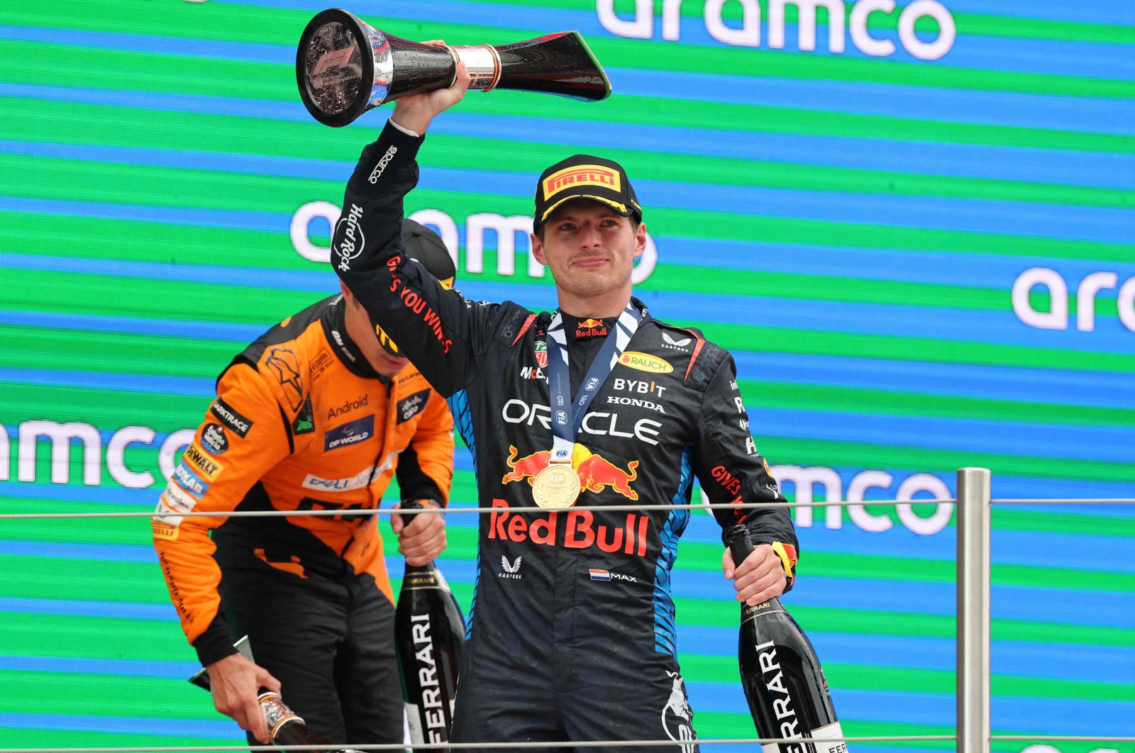 Red Bull&#039;s Dutch driver Max Verstappen celebrates on the podium winning the Spanish Formula One Grand Prix at the Circuit de Catalunya, Barcelona, Spain, June 23, 2024. (AFP Photo)