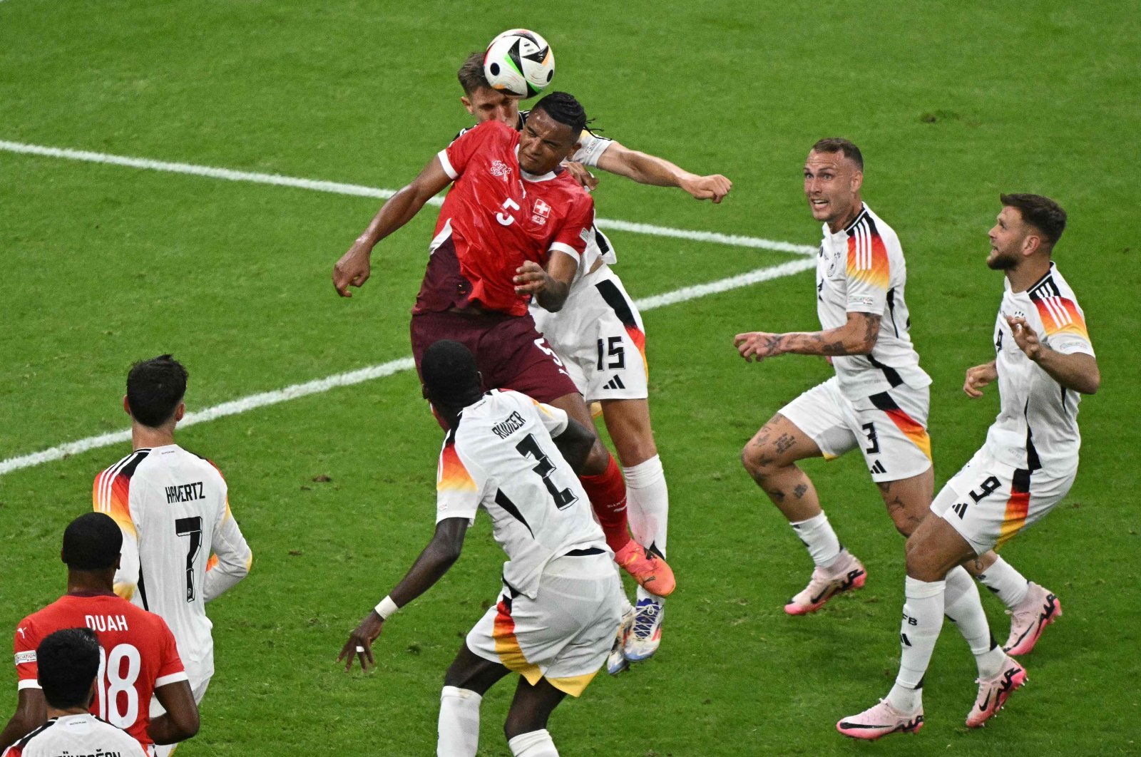 Switzerland&#039;s Manuel Akanji and Germany&#039;s Nico Schlotterbeck vie for the ball during the UEFA Euro 2024 Group A football match between Switzerland and Germany at the Frankfurt Arena, Frankfurt, Germany, June 23, 2024. (AFP Photo)