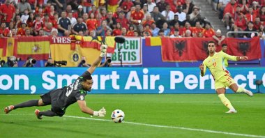 Spain&#039;s Ferran Torres (R) scores his team&#039;s first goal past Albania&#039;s Thomas Strakosha during the UEFA Euro 2024 Group B football match between Albania and Spain at the Duesseldorf Arena, Duesseldorf, Germany, June 24, 2024. (AFP Photo)