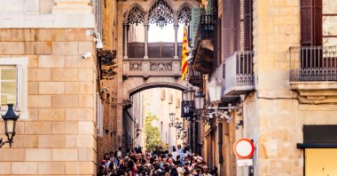 Tourists crowd the narrow alleys of the Gothic Quarter, Barcelona, Spain, April 12, 2024. (Getty Images)