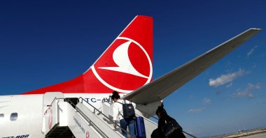 Passengers board a Turkish Airlines (THY) Boeing 777-800 plane at Hatay Airport, Hatay, southern Türkiye, March 1, 2020. (Reuters Photo)