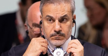 Foreign Minister Hakan Fidan listens to a speech during the opening plenary session of the Summit on Peace in Ukraine, Stansstad near Lucerne, Switzerland, June 15, 2024. (AFP Photo)