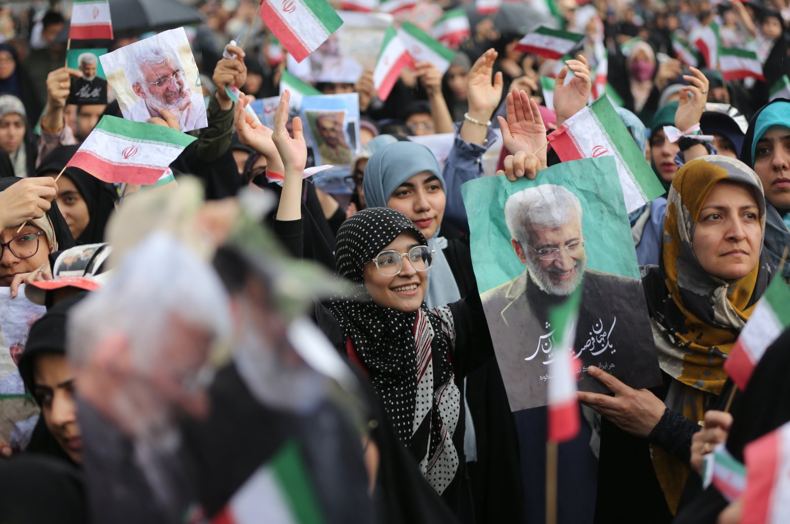 Supporters of Iranian presidential hardliner candidate Saeed Jalili cheer during an election campaign in Tehran, Iran, June 24, 2024. (EPA Photo)
