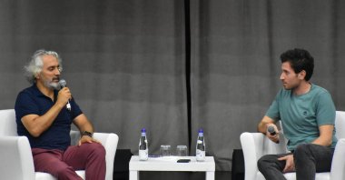 Director Mohammed Almughanni (R) delivers his speech at a Turkish Culture and Tourism Ministry&#039;s Culture Route Festival event, Trabzon, Türkiye, June 25, 2024. (AA Photo)