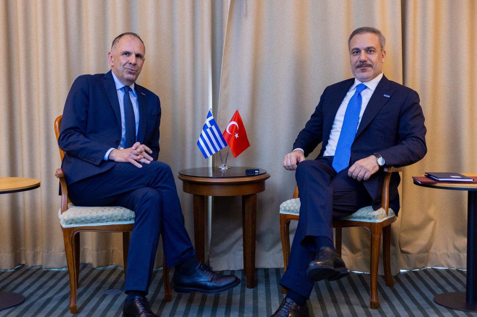 Greek Foreign Minister Giorgos Gerapetritis (L) poses with Foreign Minister Hakan Fidan during a meeting in Skopje, Macedonia, June 13, 2024. (AA Photo)
