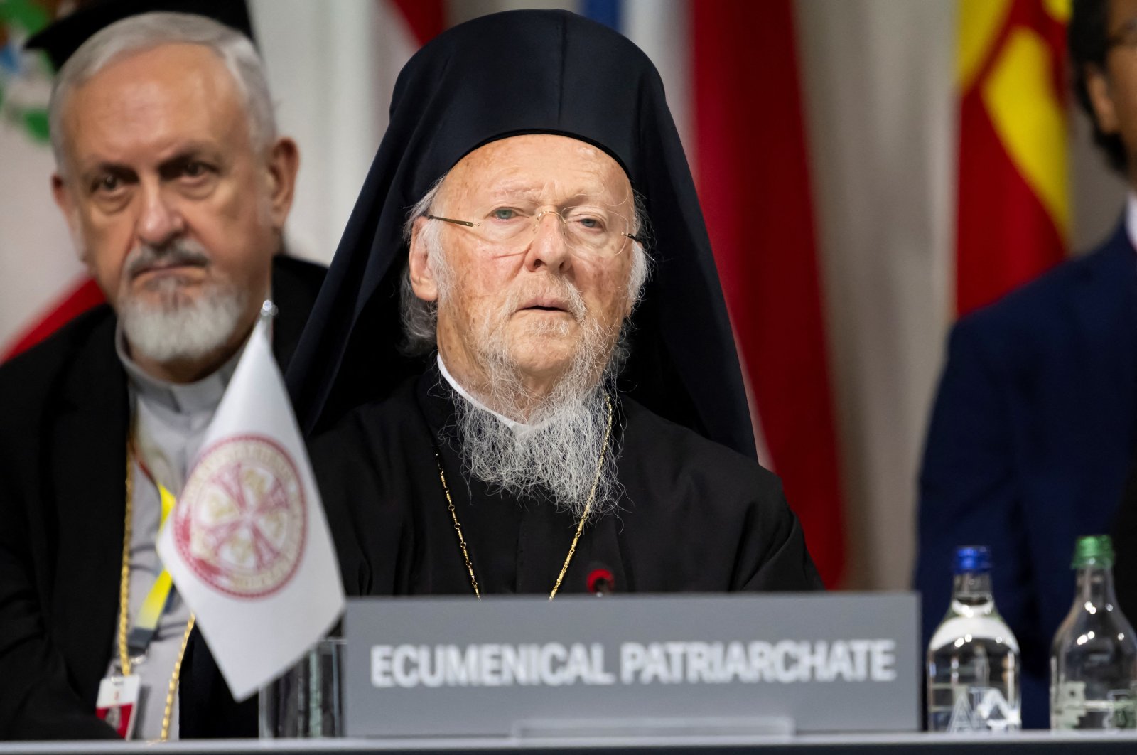 The &quot;Ecumenical Patriarchate&quot; sign is prominently displayed in front of Patriarch Bartholomew I as he attends the summit, Stansstad, Switzerland, June 16, 2024. (EPA Photo)