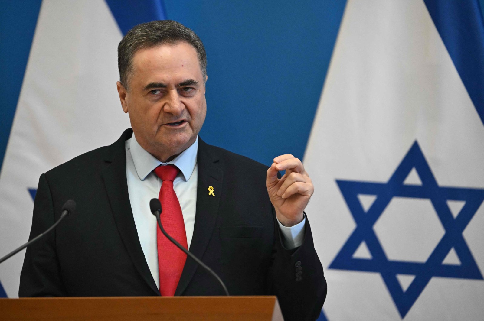 Israel&#039;s Foreign Minister Israel Katz gestures as he speaks during a joint news conference with his host Hungary&#039;s Foreign Minister at the Foreign Office in Budapest, Hungary, on June 17, 2024. (AFP Photo)