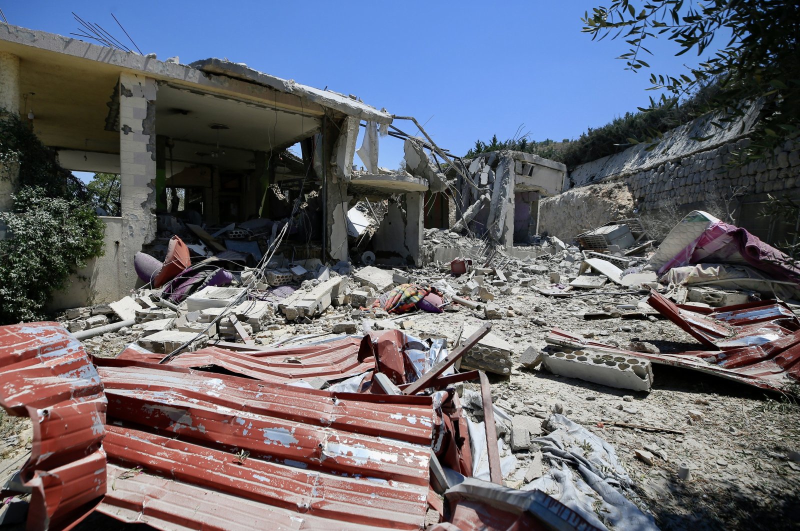 Damaged buildings after an Israeli airstrike, in Khiyam town, near the border with Israel, in Lebanon, June 26, 2024. (EPA Photo)