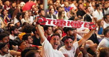 Turkish fans celebrate after the Crescent-Stars&#039; 2-1 win over Czechia at Şişli&#039;s Habitat Park, Istanbul, Türkiye, June 26, 2024. (IHA Photo)