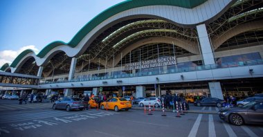 People are seen in front of Istanbul Sabiha Gökçen Airport, in Istanbul, Türkiye, in this undated photo. (IHA Photo)