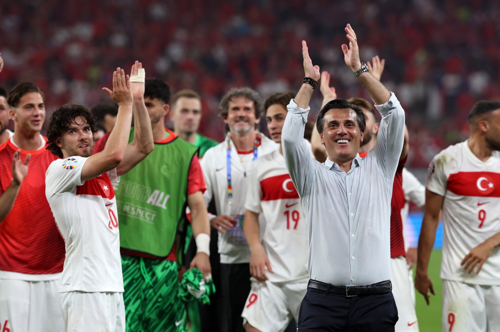 Coach Vincenzo Montella leads the Turkish Crescent-Stars in celebration after beating Czechia 2-1 at Volksparkstadion, Hamburg, Germany, June 26, 2024. (AA Photo)