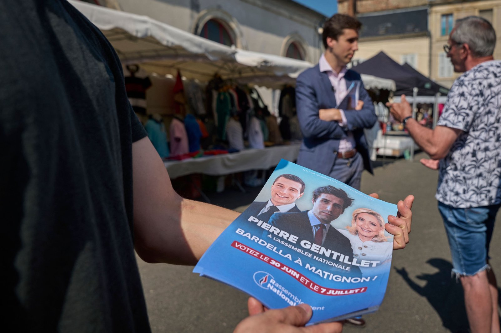 A leaflet of French far-right Rassemblement National (RN) party member Pierre Gentillet is seen at a market in Sancoins, central France, June 26, 2024. (AFP Photo)