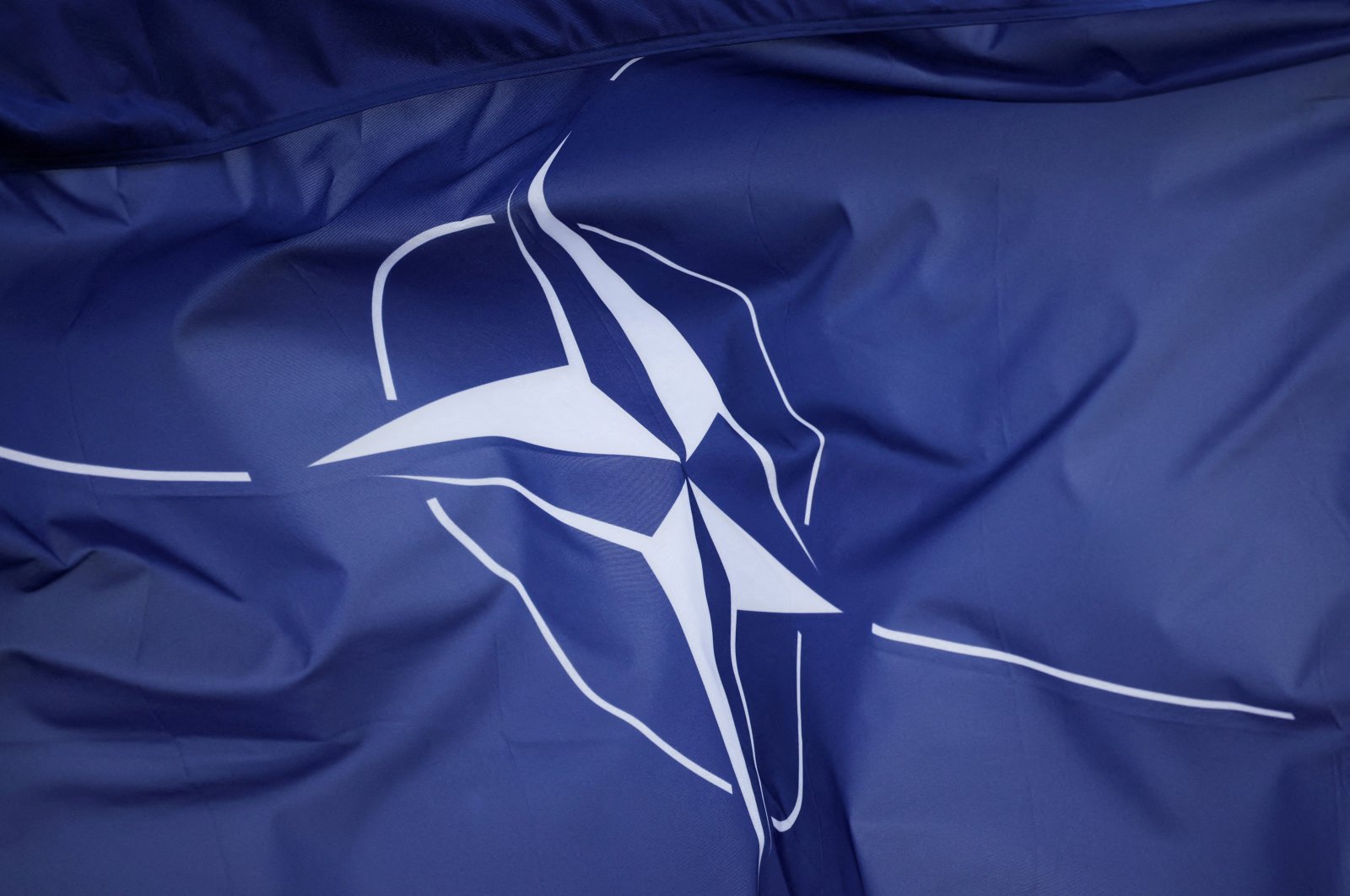  A view of a NATO flag at NATO Dragon-24, part of the Steadfast Defender 2024, exercise in Korzeniewo, Poland, March 4, 2024. (Reuters File Photo)