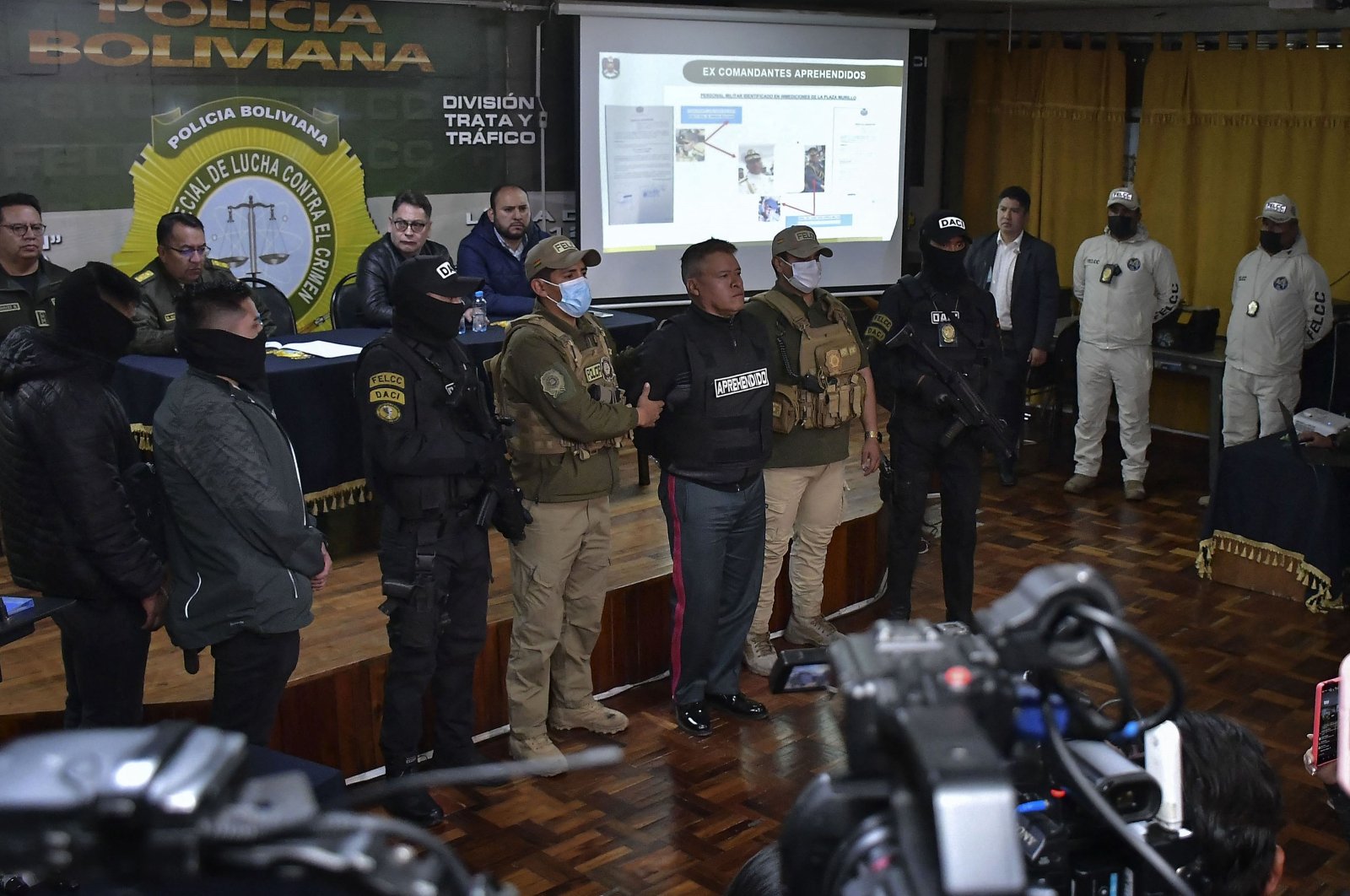 Bolivia&#039;s now-dismissed army chief General Juan Jose Zuniga (C) is escorted by policemen following his arrest after he led a military movement that attempted to seize the government palace by force in La Paz, Bolivia, June 26, 2024. (AFP Photo)