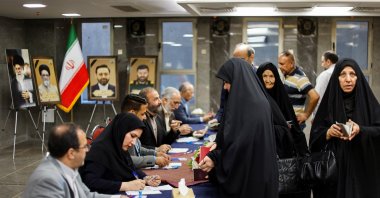 Iranian voters participate in a snap presidential election to choose a successor to Ebrahim Raisi following his death in a helicopter crash, the Iranian Embassy, Baghdad, Iraq, June 28, 2024. (Reuters Photo)