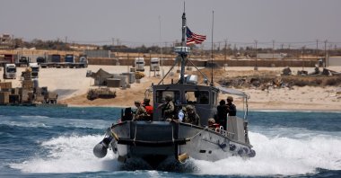 An American boat carrying American soldiers and journalists sails near the Trident Pier, a temporary pier to deliver aid, off the Gaza Strip, June 25, 2024. (Reuters Photo)