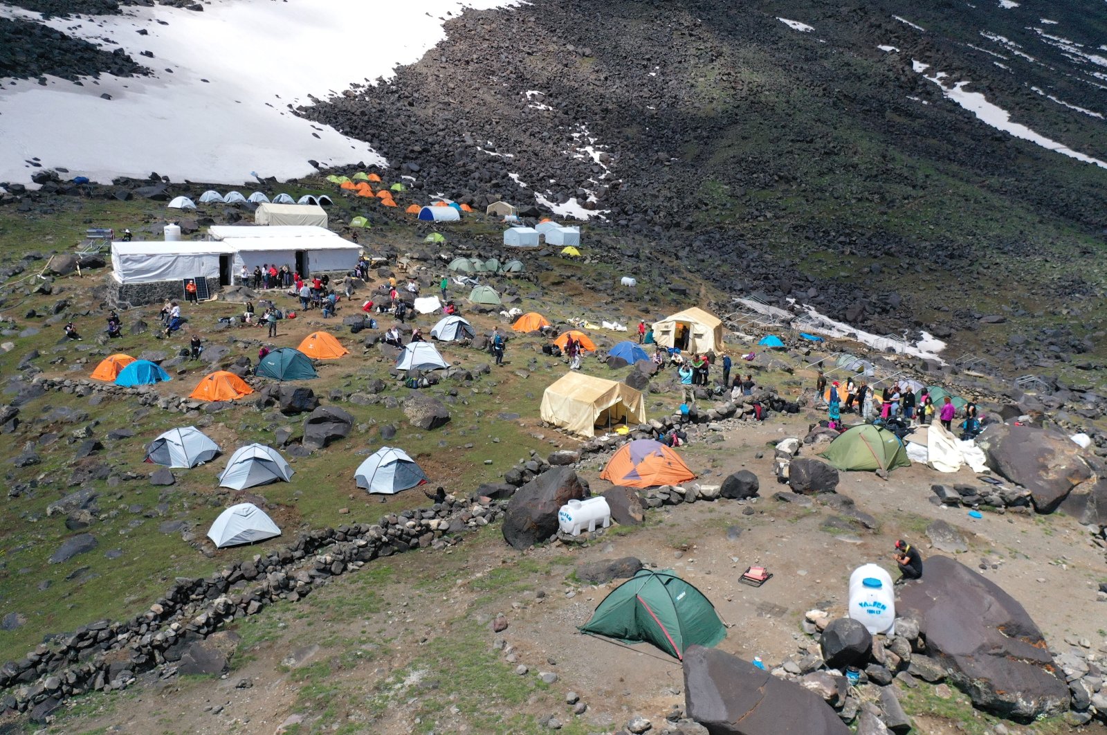 Climbers from around the world create a festive atmosphere at Mount Ağrı&#039;s base camp, eastern Türkiye, June 15, 2024. (AA Photo)
