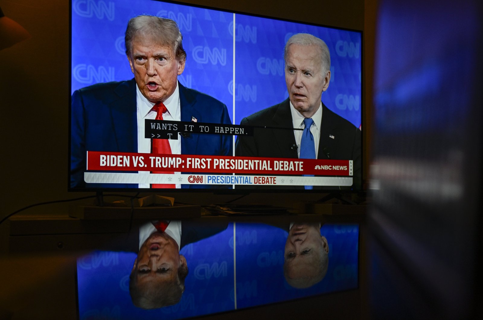 The screen shows a debate between President Joe Biden and presumptive Republican nominee former President Donald Trump, Chicago, U.S., June 27, 2024. (AA Photo)