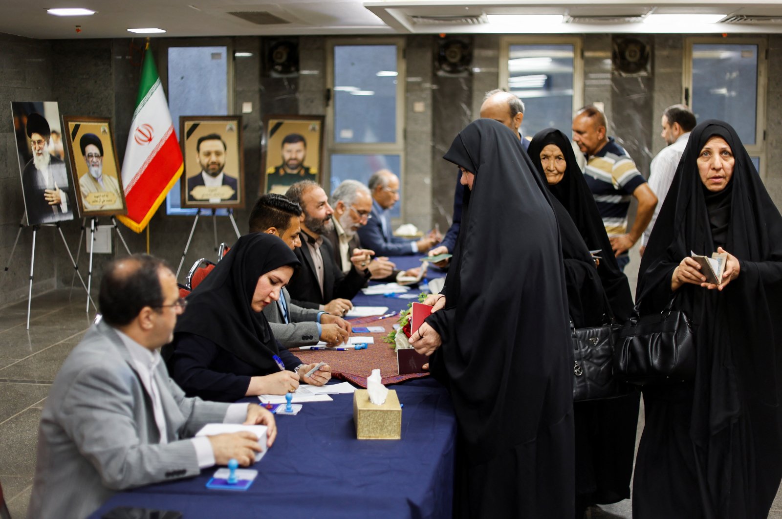 Iranian voters participate in a snap presidential election to choose a successor to Ebrahim Raisi following his death in a helicopter crash, the Iranian Embassy, Baghdad, Iraq, June 28, 2024. (Reuters Photo)