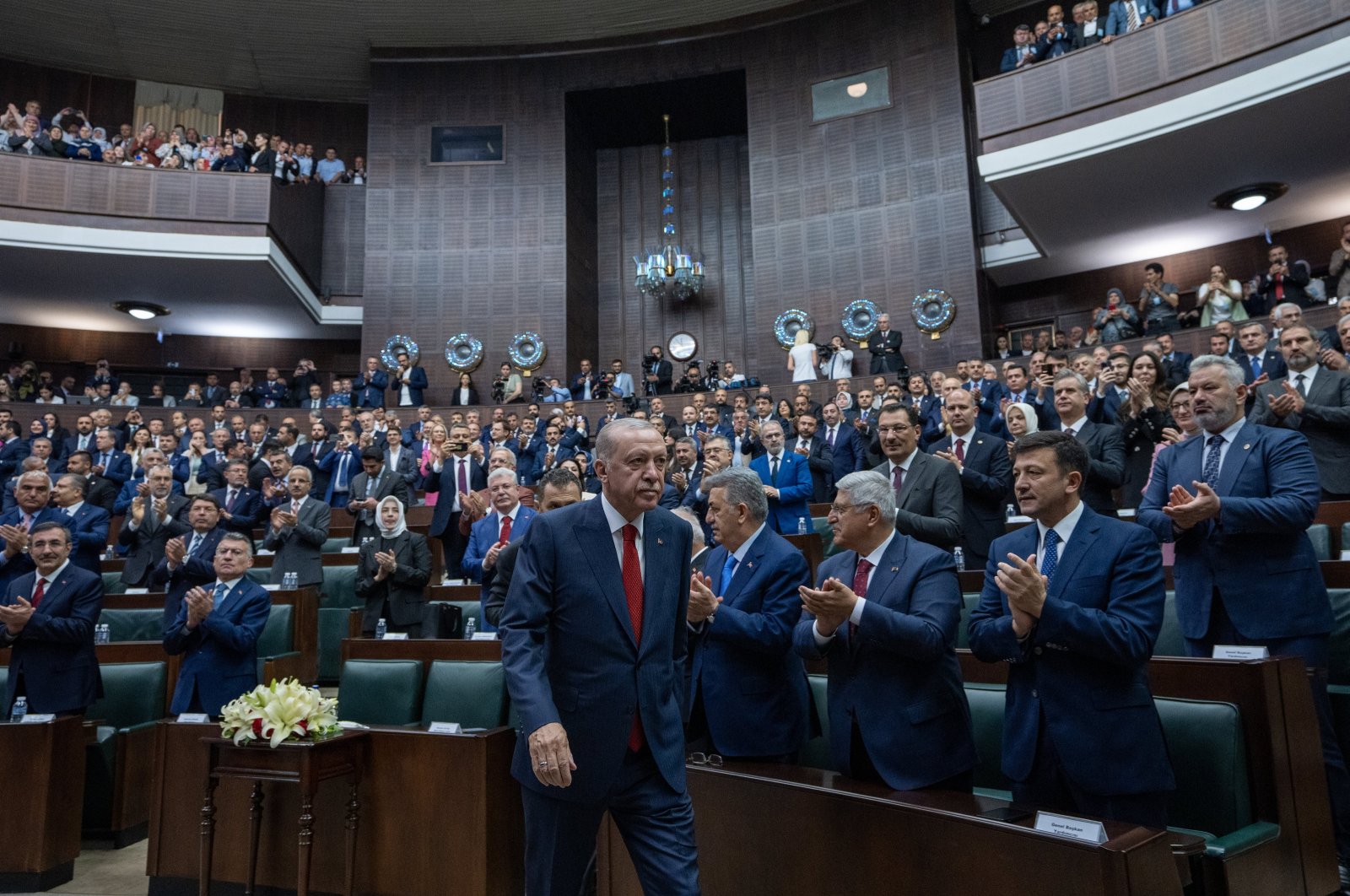 AK Party members applaud President Recep Tayyip Erdoğan at the party&#039;s parliamentary group meeting, Ankara, Türkiye, June 26, 2024. (AA Photo)