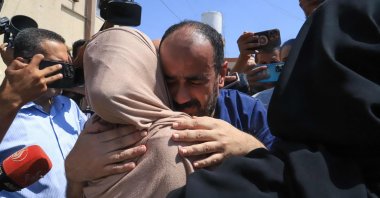 Al-Shifa hospital Director Mohammed Abu Salmiya, who was detained by Israeli forces since November, is welcomed by relatives, in Khan Yunis, southern Gaza Strip, Palestine, July 1, 2024. (AFP Photo)