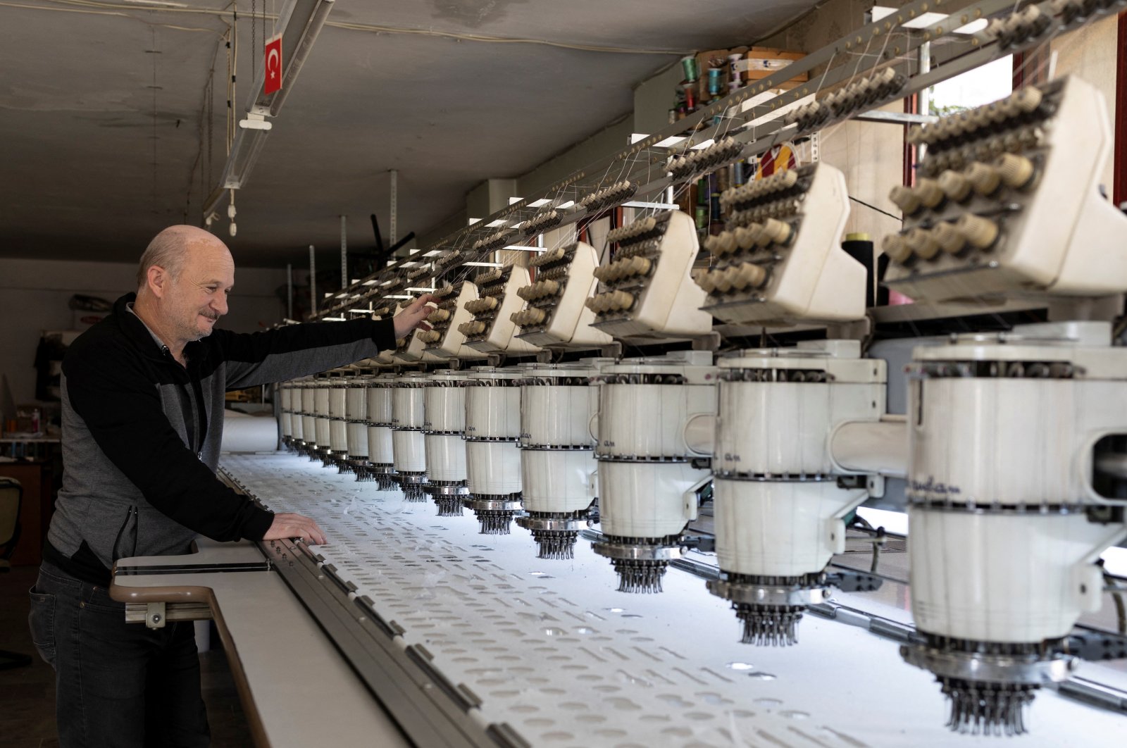 An employee works at a textile factory, Istanbul, Türkiye, Nov. 15, 2023. (Reuters Photo)