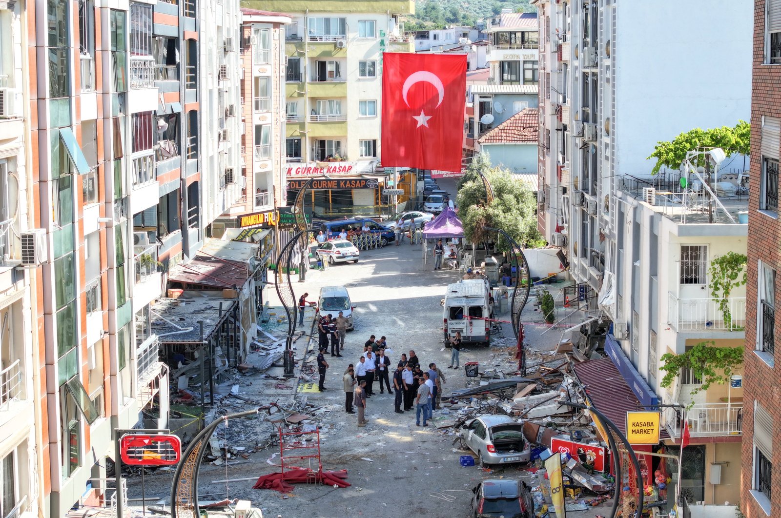 The gendarmerie secures the street, restricting entry due to damage to businesses and homes, Izmir, Türkiye, July 1, 2024. (AA Photo)