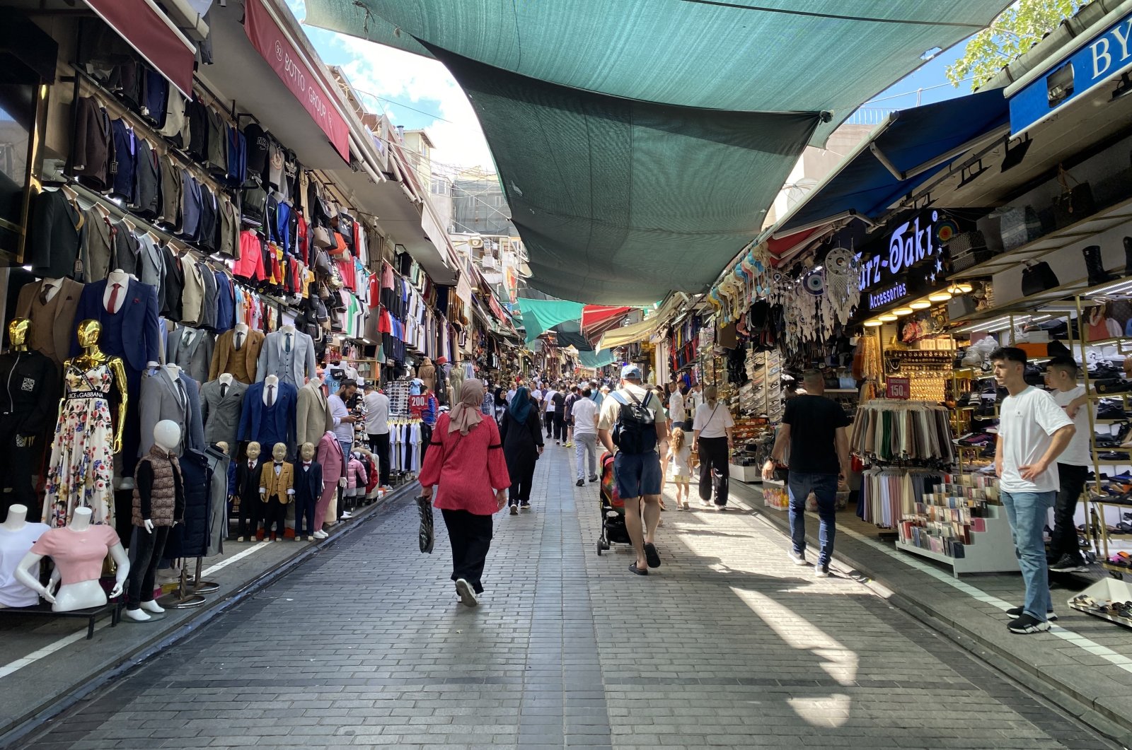 People are seen at a local marketplace in the famous Eminönü neighborhood in Istanbul, Türkiye, June 15, 2024. (IHA Photo)