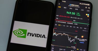 The stock price of Nvidia (Nasdaq: NVDA) is displayed on a mobile phone in Yichang, Hubei Province, China, May 23, 2024. (Reuters Photo)