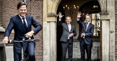 New Dutch Prime Minister Dick Schoof (R) with Secretary-General of the General Affairs Ministry, Gert-Jan Buitendijk (C) wave to former Dutch Prime Minister Mark Rutte as he leaves the Torentje, the Prime Minister&#039;s office, in The Hague, the Netherlands, July 2, 2024. (EPA Photo)