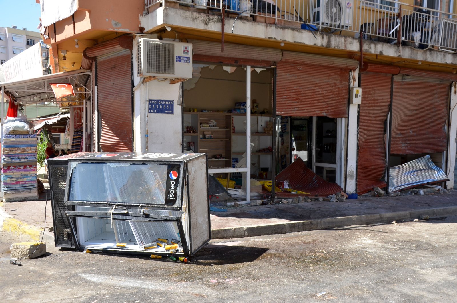 A view of a shop damaged in anti-Syrian riots in the Serik district of Antalya, southern Türkiye, July 2, 2024. (DHA Photo)