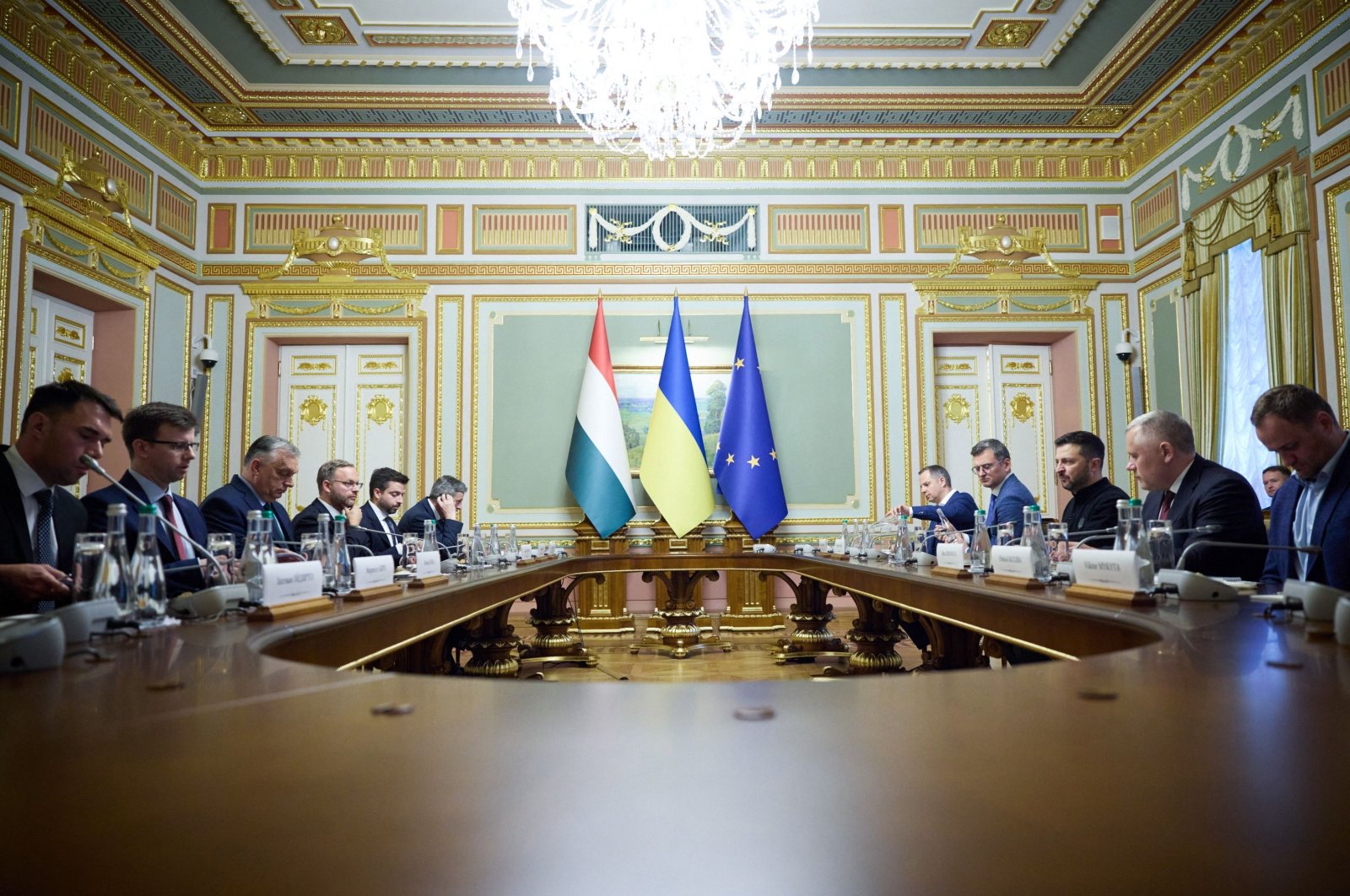 This handout photograph taken and released by Ukrainian Presidential Press Service on July 2, 2024, shows Ukraine&amp;#039;s President Volodymyr Zelenskyy (3rd-R) and Hungary&amp;#039;s Prime Minister Viktor Orban (3rd-L) attend a bilateral meeting in Kyiv. (AFP Photo)