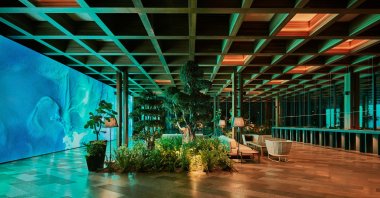 Refik Anadol, a pioneer in the field of AI art presents an installation that captivates visitors in the lobby of Maxx Royal Bodrum, Muğla, Türkiye, July 1, 2024. (Photo courtesy of Maxx Royal Bodrum)