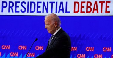 Democrat presidential candidate U.S. President Joe Biden listens as Republican presidential candidate former U.S. President Donald Trump speaks during their debate in Atlanta, Georgia, U.S., June 27, 2024. (Reuters Photo)