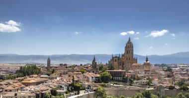 View of the city of Segovia from the Tower of Juan II del Alcazar, as the imposing silhouette of the Gothic cathedral of Santa Maria stands out, Segovia, Spain, June 25, 2021. (Getty Images Photo)
