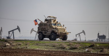 A U.S. military vehicle on a patrol in the countryside near the town of Qamishli, Syria, Dec. 4, 2022. (AP File Photo)