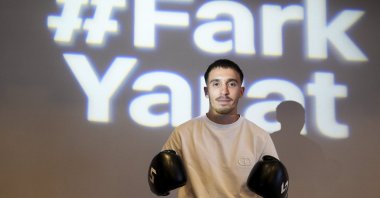 Turkish boxing sensation Samet Gümüş poses for a photo after an interview with Anadolu Agency, Istanbul, Türkiye, July 3, 2024. (AA Photo)