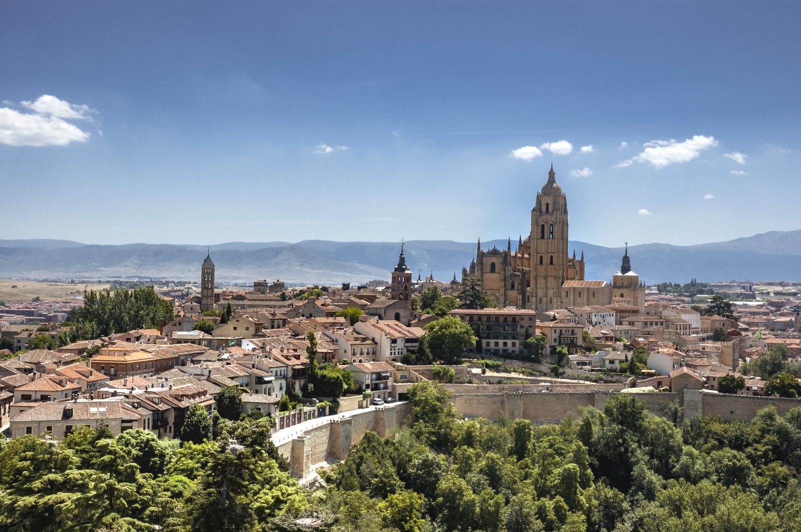 View of the city of Segovia from the Tower of Juan II del Alcazar, as the imposing silhouette of the Gothic cathedral of Santa Maria stands out, Segovia, Spain, June 25, 2021. (Getty Images Photo)