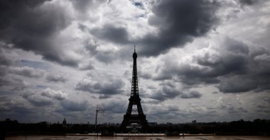 The Eiffel Tower with the Olympic rings displayed on the first floor is pictured from the Trocadero square in Paris, France, July 3, 2024. (Reuters Photo)