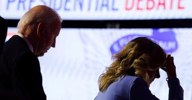 Democrat candidate U.S. President Joe Biden walks offstage with first lady Jill Biden at the conclusion of a presidential debate with Republican presidential candidate former U.S. President Donald Trump, Atlanta, Georgia, U.S., June 27, 2024. (Reuters Photo)