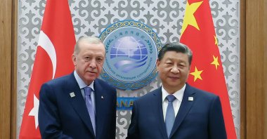 President Recep Tayyip Erdoğan (L) shakes hands with Chinese President Xi Jinping during their meeting, Astana, Kazakhstan, July 4, 2024. (AA Photo)