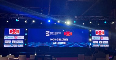 Participants watch a presentation at Blockchain Expo World Istanbul, Istanbul, Türkiye, July 4, 2024. (Photo by Betül Tilmaç)